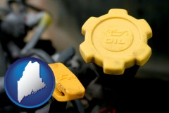 maine map icon and automobile engine fluid fill caps