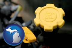 michigan map icon and automobile engine fluid fill caps