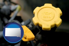 south-dakota map icon and automobile engine fluid fill caps
